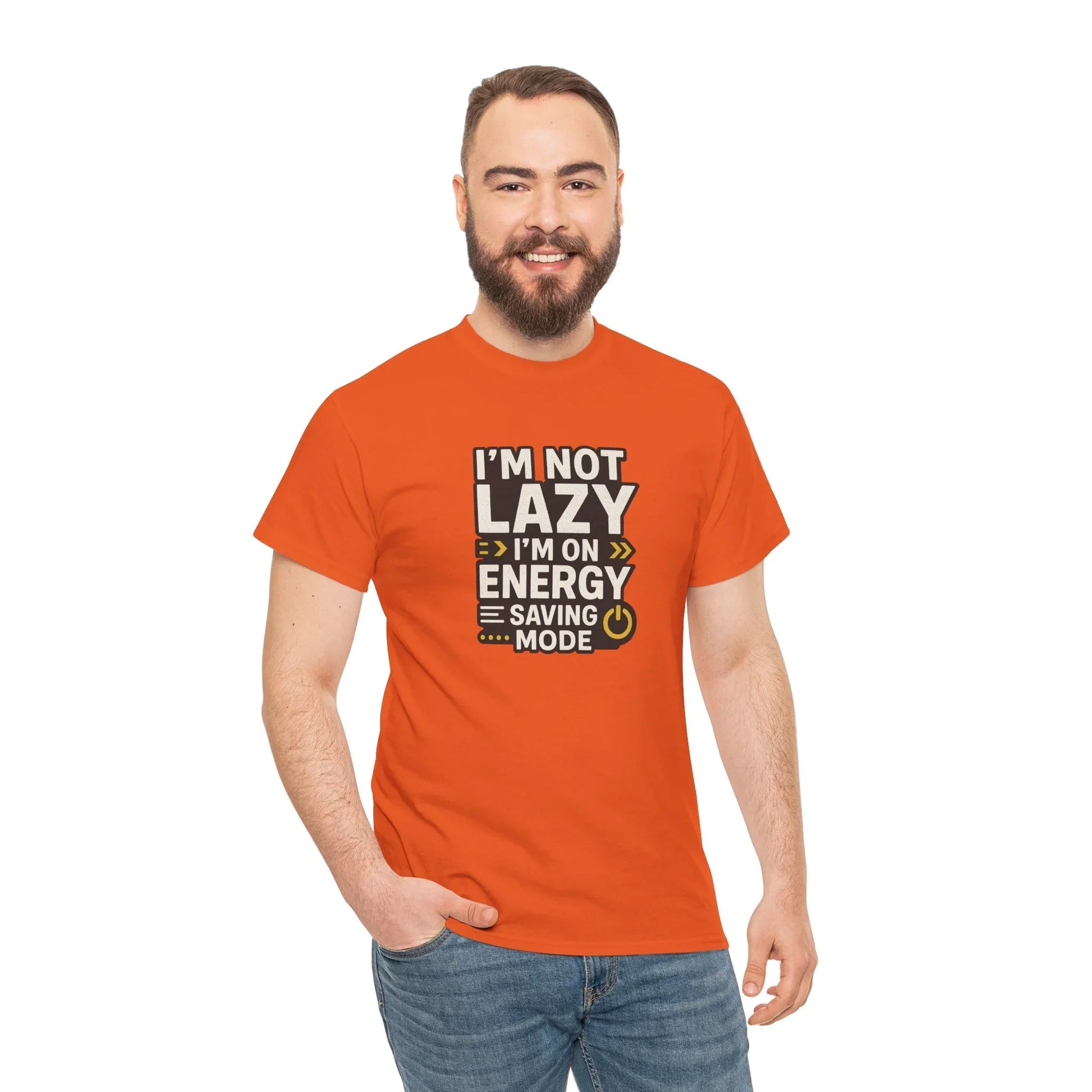 Man wearing orange graphic t-shirt with I'm Not Lazy I'm On Energy Saving Mode text