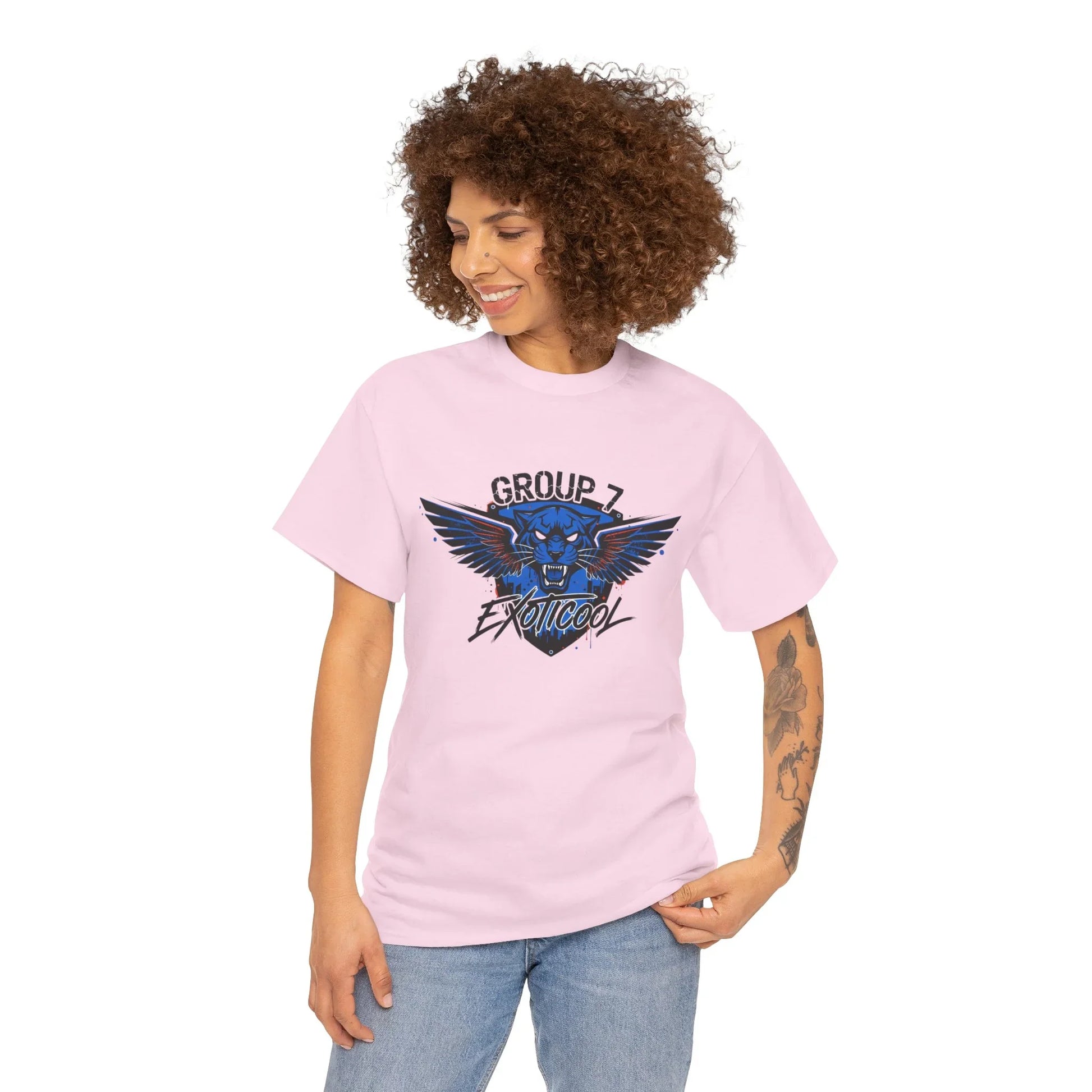 Woman wearing light pink Group 7 Exoticool graphic t-shirt with blue winged panther design