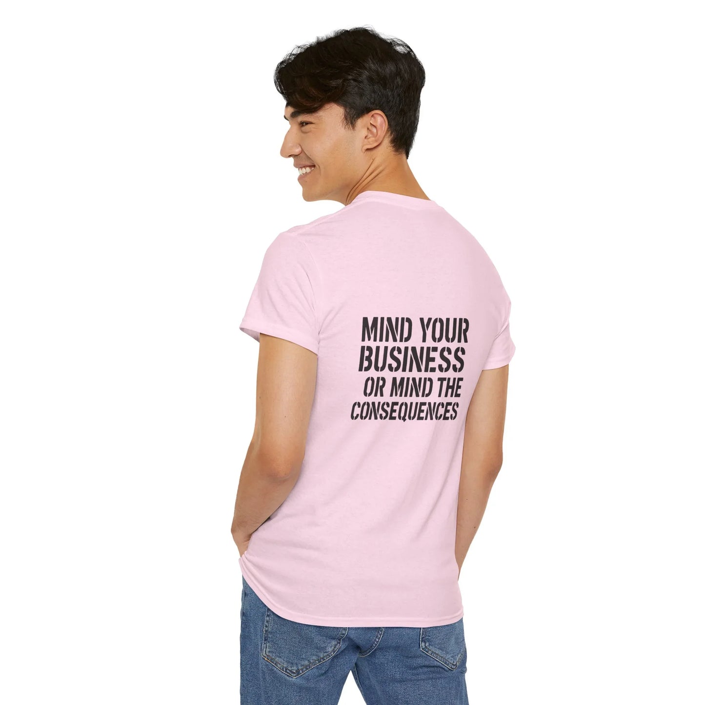Man in pink graphic t-shirt with 'Mind Your Business Or Mind The Consequences' text