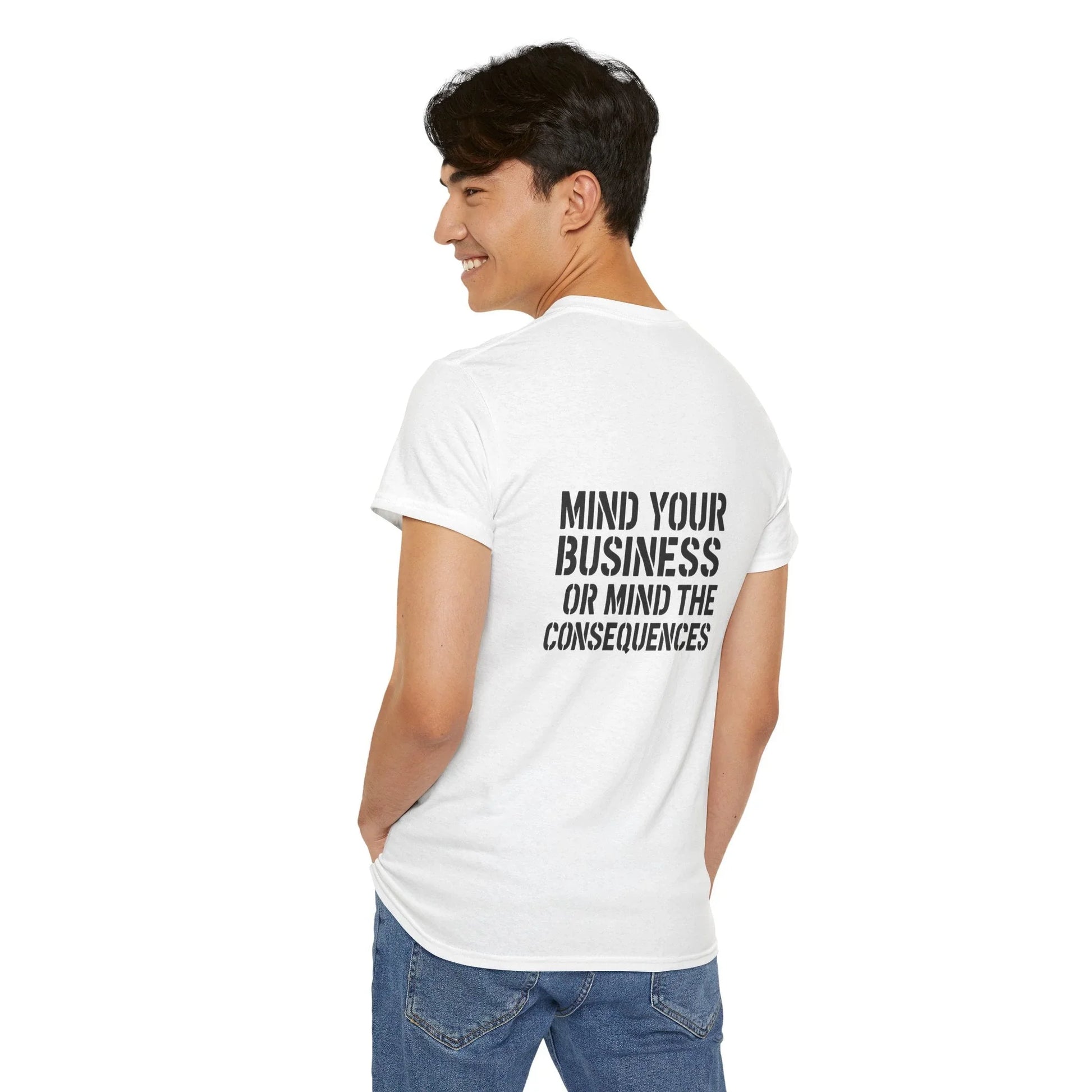 Man wearing white graphic t-shirt with 'Mind Your Business Or Mind The Consequences' text on back